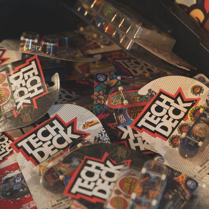 Pile of Tech Deck fingerboards in packaging